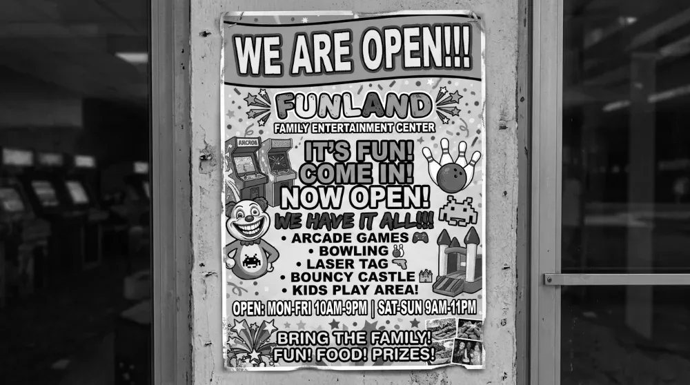 A hand-made We Are Open poster on a venue door, the kind of promotion no one can measure