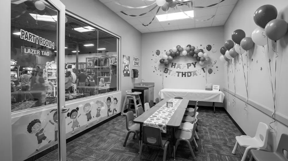 Decorated party room set for a birthday group, ready for more party bookings